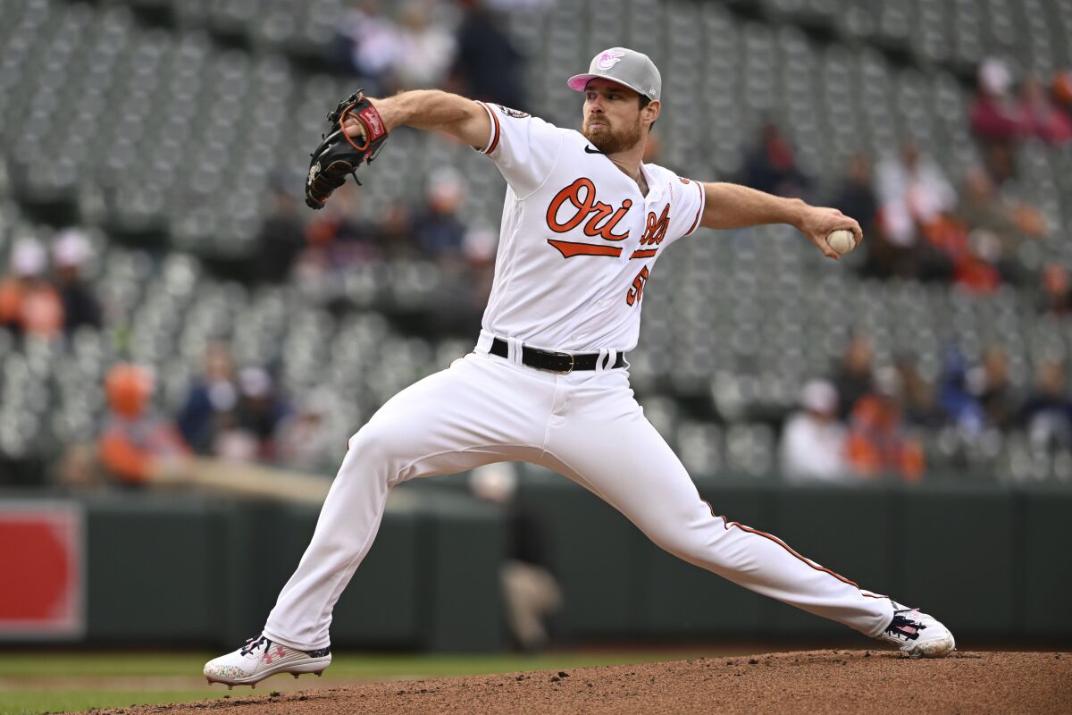 Baltimore Orioles pitcher Bruce Zimmerman throws against the Kansas City Royals in the first inning of the second game of a baseball doubleheader, Sunday, May 8, 2022, in Baltimore. (AP Photo/Gail Burton)