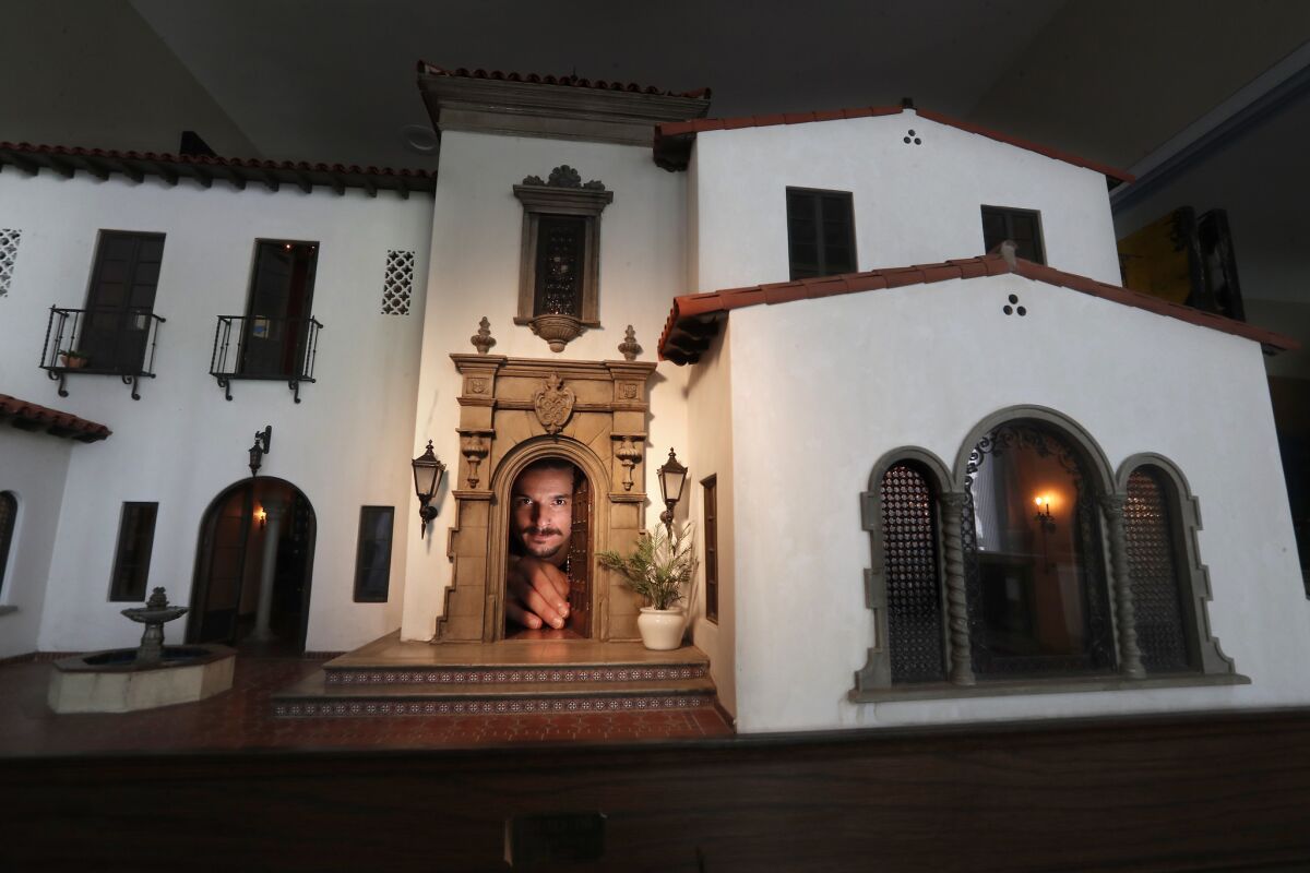 Artist Chris Toledo has spent the last two years working on a grand home in miniature in his apartment in MacArthur Park. The home, which is loaded with architectural details, is scaled down to 1/12th the size of a real home.