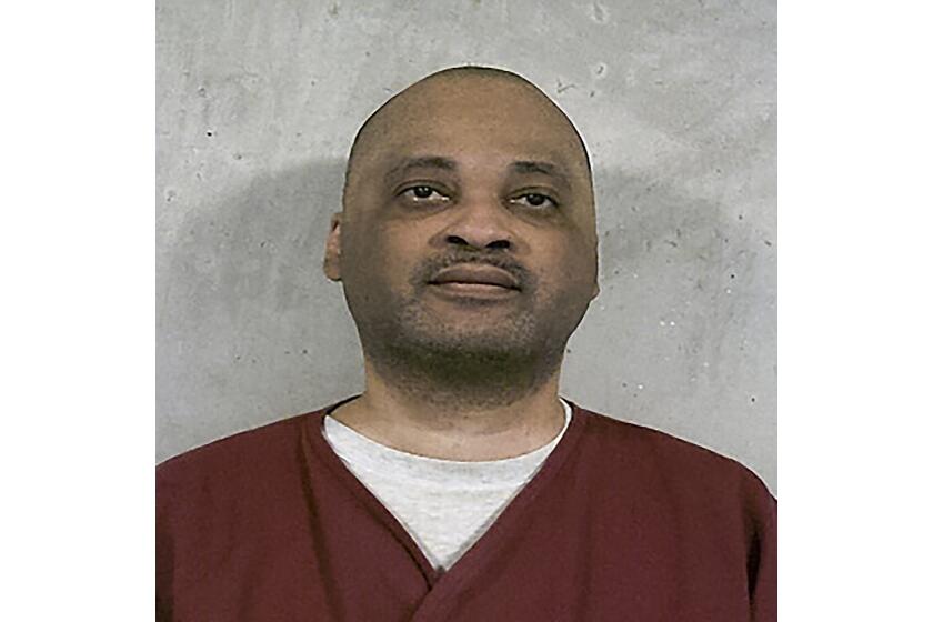 FILE - This Feb. 11, 2023, booking photo provided by the Oklahoma Department of Corrections shows death row inmate Jemaine Cannon. Oklahoma is preparing to execute Cannon on Thursday, July 20, 2023, for stabbing 20-year-old Sharonda Clark to death with a butcher knife in 1995 after his escape from a prison work center. In a statement sent to The Associated Press this week, Cannon's attorney, Mark Henricksen, said the state's decision to proceed with Cannon's execution amounts to “historic barbarism.” But prosecutors from the attorney general's office and Clark's adult daughters have urged the state to execute Cannon. (Oklahoma Department of Corrections via AP, File)