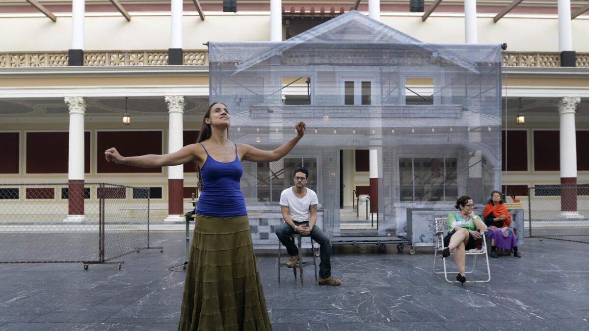 The cast of "Mojada: A Medea in Los Angeles" rehearses at the Getty Villa in 2015.