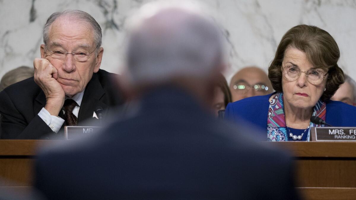 Senate Judiciary Committee Chairman Charles E. Grassley, left, sharply criticized Sen. Dianne Feinstein's decision to release testimony from the co-founder of Fusion GPS.