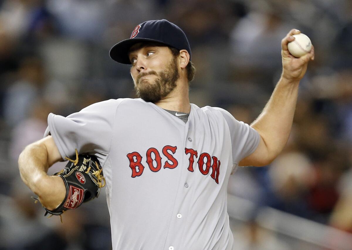 Red Sox starting pitcher Wade Miley delivers in the first inning against the Yankees. Miley was acquired by the Mariners in a four-player deal.