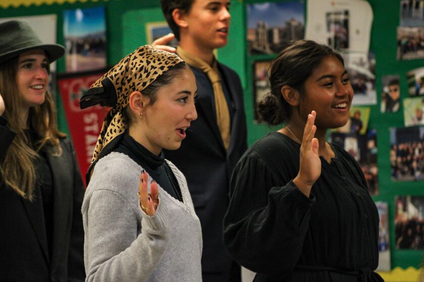 Edison High Students take the Oath of Allegiance after undergoing entry at a simulated Ellis Island in a history lesson.