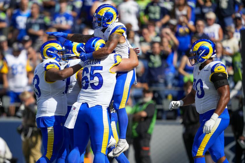 Rams running back Kyren Williams celebrates after scoring against the Seattle Seahawks,