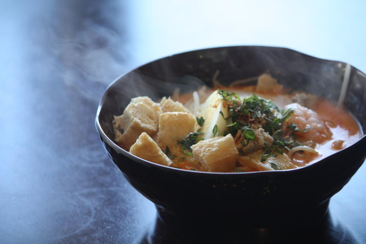 In Pasadena, the Singaporean coffee shop QQ Kopitiam serves a mild laksa in addition to other Singaporean street food dishes.