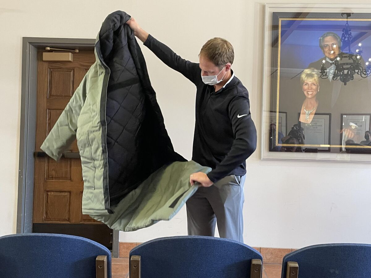 Drew Moseropens an Empowerment Plan coat that converts into a sleeping bag.