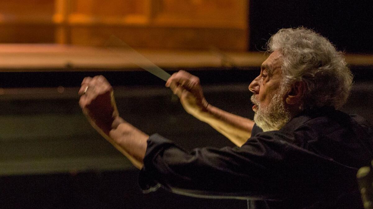 Placido Domingo conducts the orchestra in the L.A. Opera production of "The Tales of Hoffmann."
