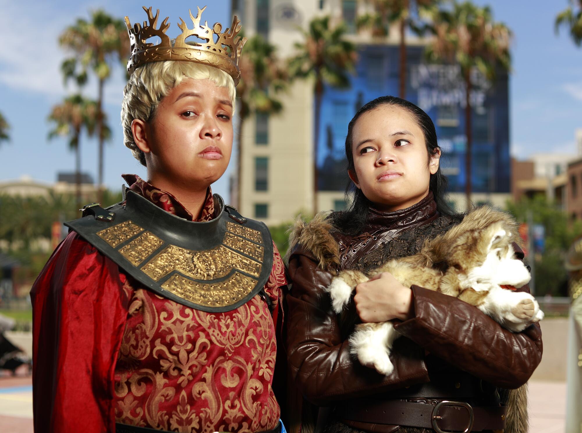 Jasmine Ty of San Francisco, left, dressed as King Joffrey Baratheon and Avanisse Yuvienco of Murrieta as Arya 