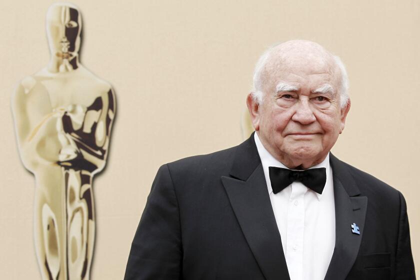 FILE - In this March 7, 2010, file photo, actor Ed Asner arrives during the 82nd Academy Awards in the Hollywood section of Los Angeles. Asner, the blustery but lovable Lou Grant in two successful television series, has died. He was 91. Asner's representative confirmed the death in an email Sunday, Aug. 29, 2021, to The Associated Press. (AP Photo/Matt Sayles, File)