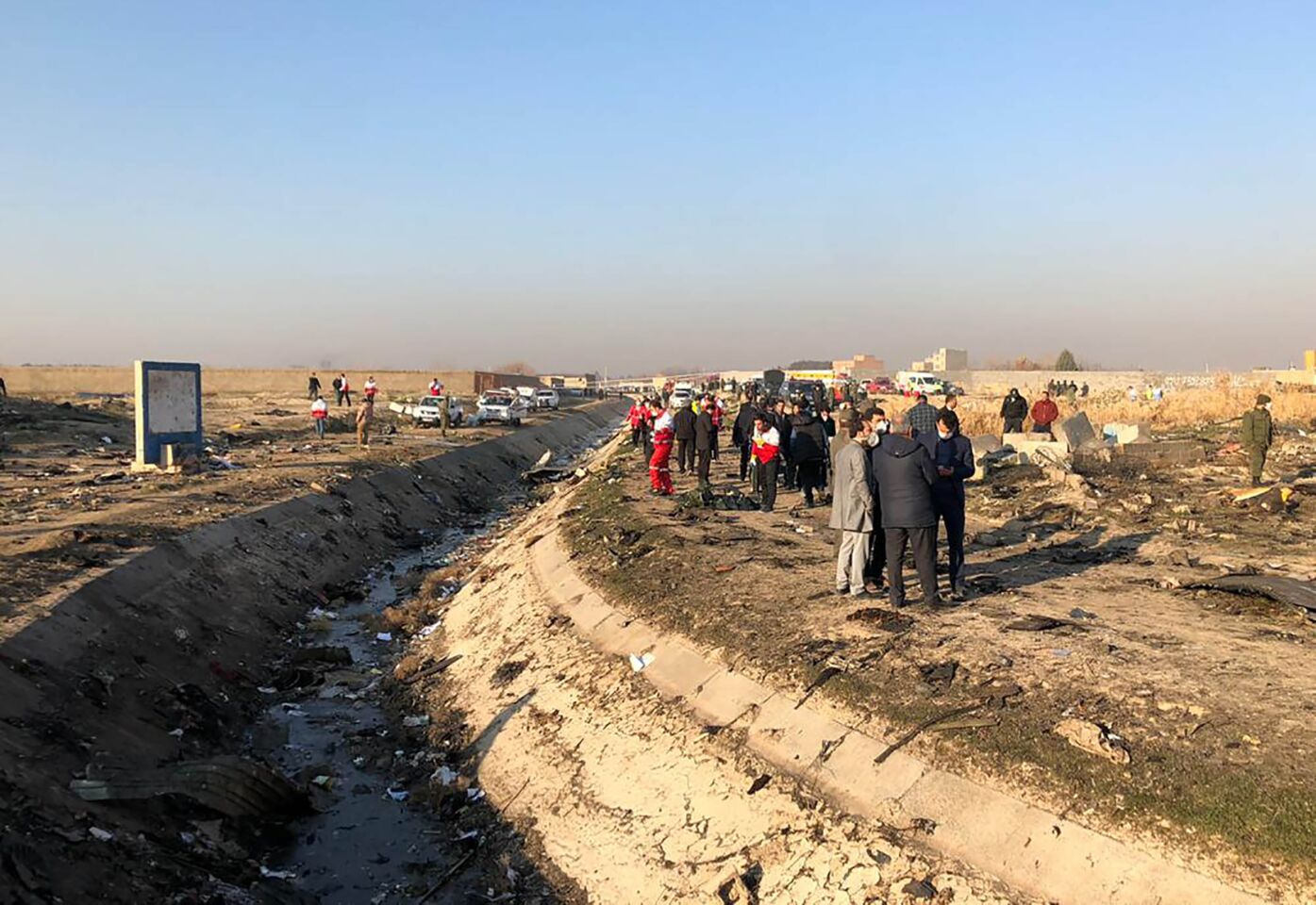 Another view of the debris from Wednesday's plane crash. The crash came hours after Iran launched a ballistic missile attack targeting two bases in Iraq housing U.S. forces in retaliation for the killing of Revolutionary Guard Gen. Qassem Suleimani.