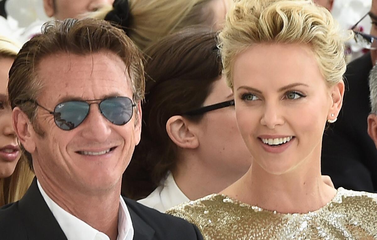 Charlize Theron brings daughter Jackson to Dior fashion show