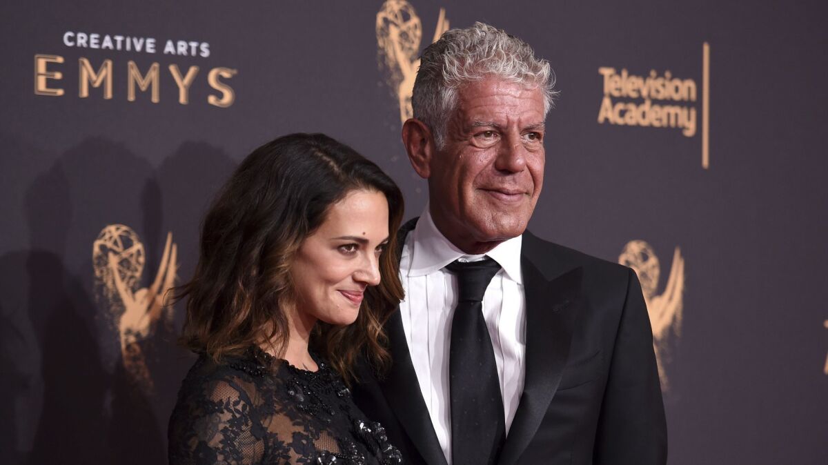 Asia Argento and Anthony Bourdain appear at the Microsoft Theater on Saturday, Sept. 9, 2017, in Los Angeles.