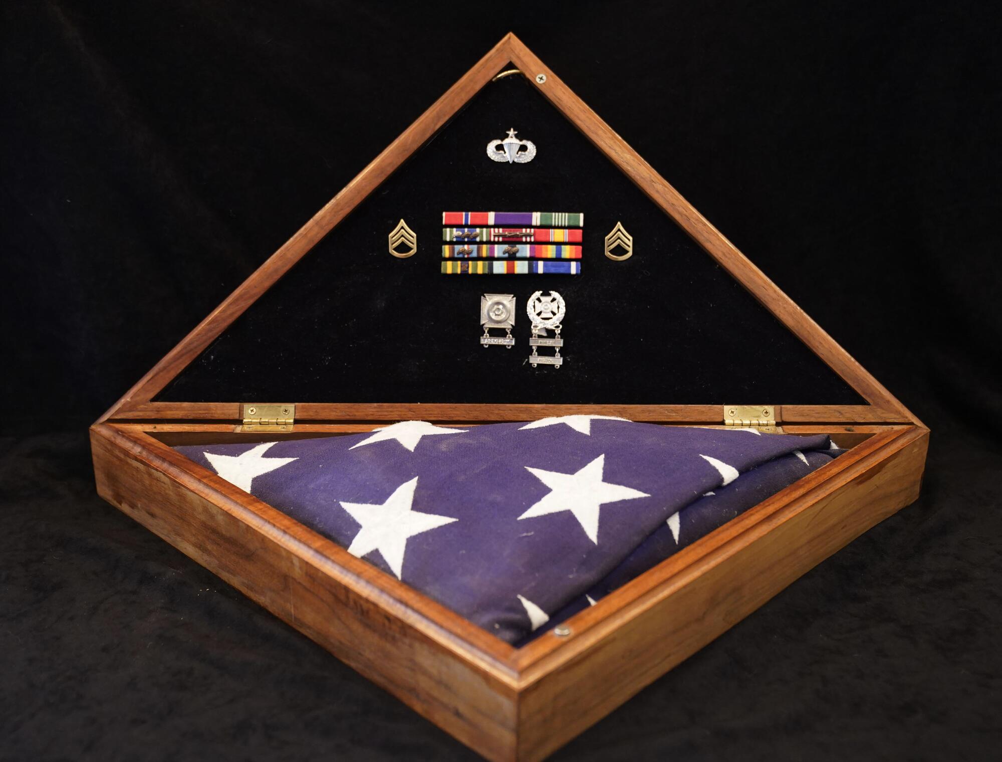 The wooden box given to Shawna that contains Brian Cody Prosser's medals and the flag that draped the coffin of her husband 