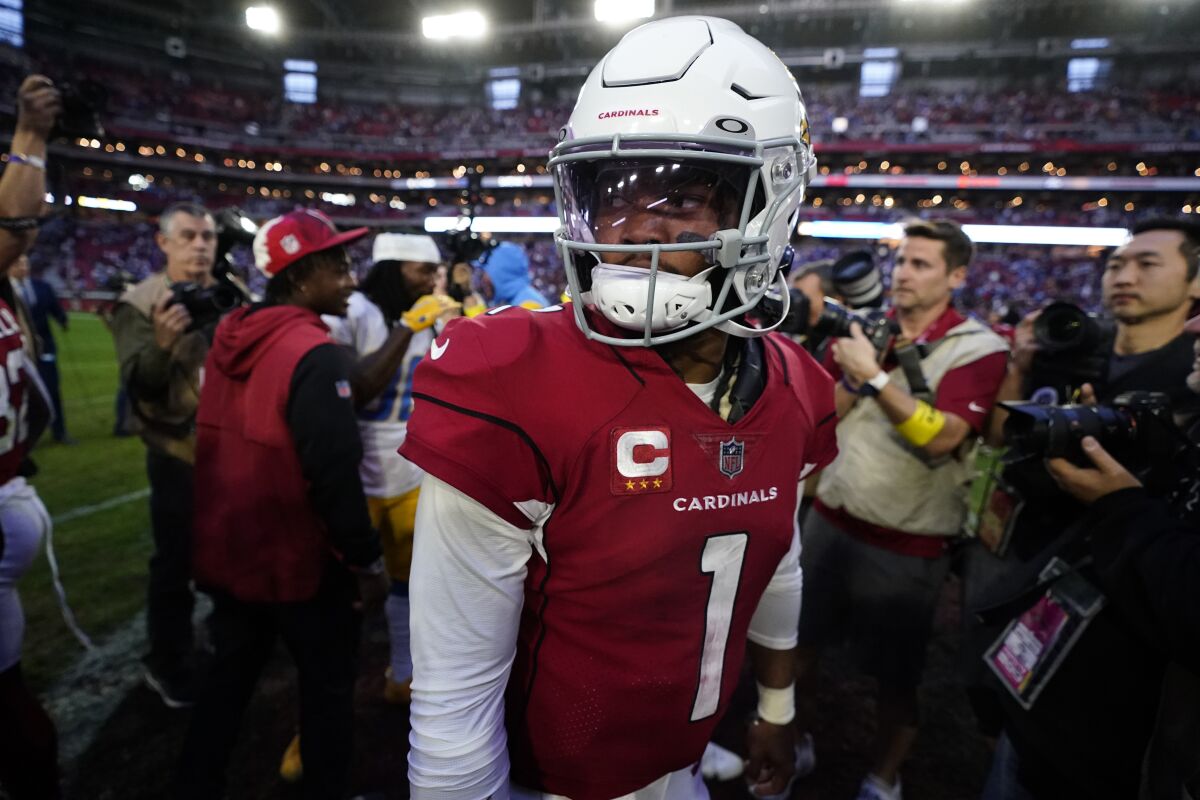 Arizona Cardinals quarterback Kyler Murray (1) walks off the field after an NFL football game against the Los Angeles Chargers, Sunday, Nov. 27, 2022, in Glendale, Ariz. The Chargers defeated the Cardinals 25-24. (AP Photo/Ross D. Franklin)