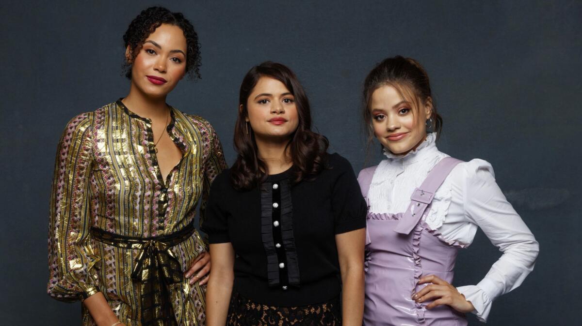 Madeleine Mantock, from left, Melonie Diaz and Sarah Jeffery from the television series "Charmed."