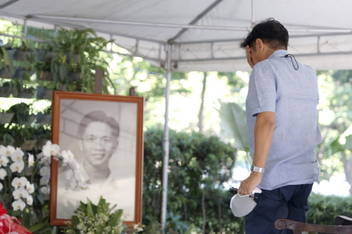 In this photo provided by the Office of Ferdinand Marcos Jr., Presidential candidate Ferdinand "Bongbong" Marcos Jr. visits the tomb of his father at the National Heroes Cemetery in Metro Manila, Philippines, on Tuesday May 10, 2022. Marcos, the namesake son of longtime dictator Ferdinand Marcos, apparent landslide victory in the Philippine presidential election is raising immediate concerns about a further erosion of democracy in Asia and could complicate American efforts to blunt growing Chinese influence and power in the Pacific.(Office of Ferdinand Marcos Jr. via AP)