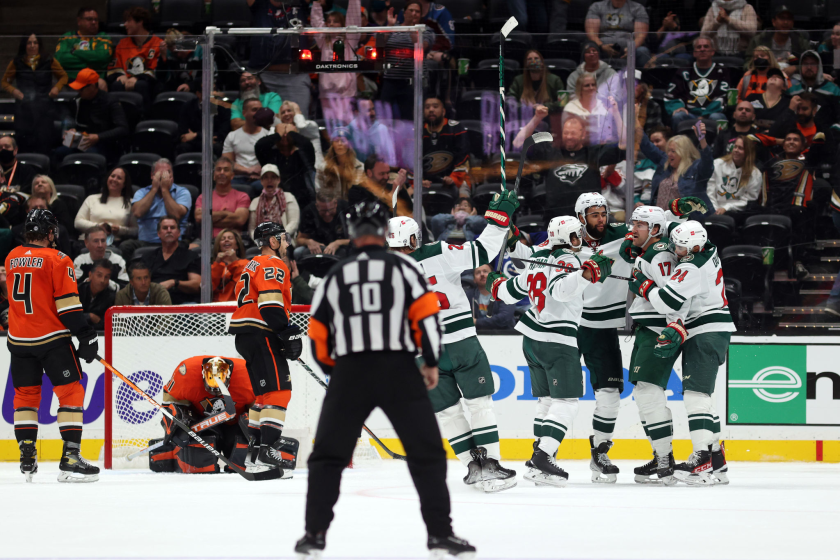 The Wild's Marcus Foligno (17), right, celebrates a goal against the Ducks in the third period Oct. 15, 2021 in Anaheim.