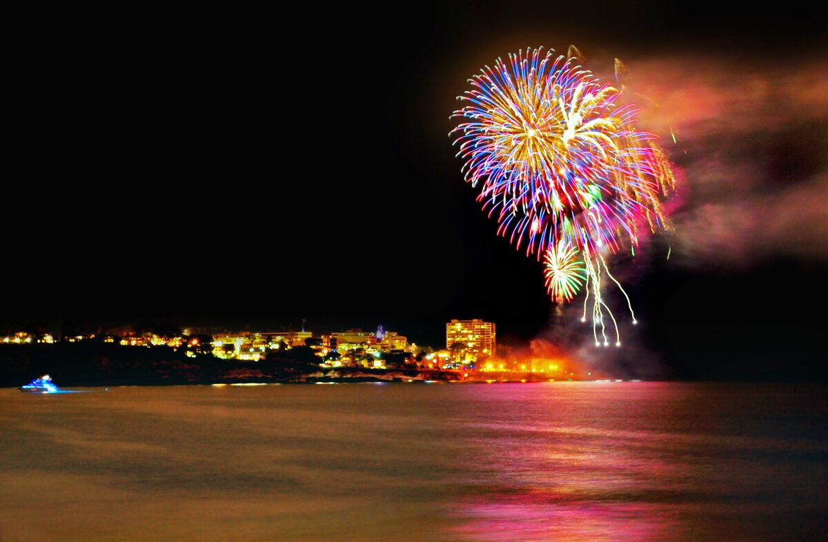 Fireworks explode over La Jolla Cove during a previous Fourth of July celebration. There will be no fireworks show this year.