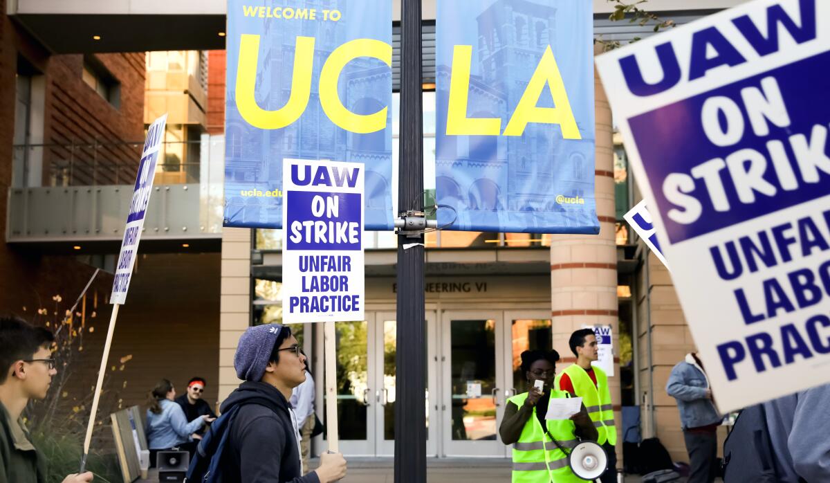Demonstrators picket at UCLA as nearly 48,000 University of California academic workers go on strike on Nov. 14.