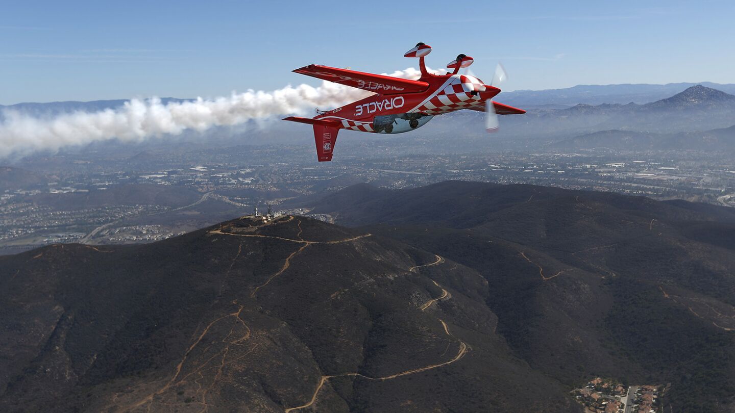 Stunt pilot Sean Tucker took Hannah Hollinger, 16, of El Cajon on a flight in his stunt plane at the MCAS Miramar Air Show on September 27, 2018. The flight was part of the EAA Young Eagle flight program which introduces kids to flight. Tucker is the chairman of the EAA Young Eagles. (Photo by K.C. Alfred/San Diego Union-Tribune)