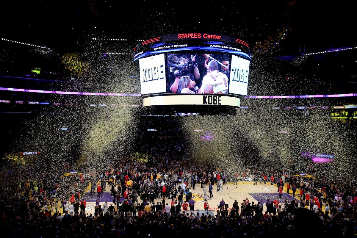 Confetti covers the Staples Center on Wednesday night following Kobe Bryant's final game with the Lakers.