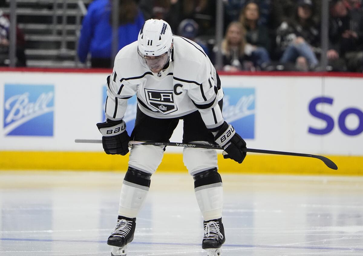 Kings captain Anze Kopitar stands on the ice during a game.