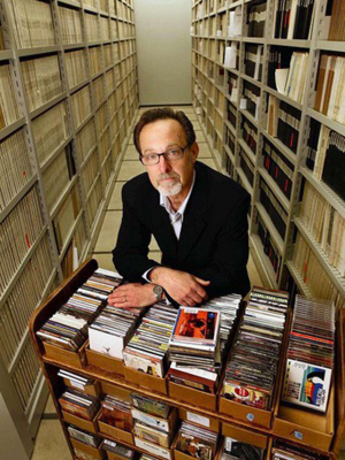 RECORD COLLECTION: Gene DeAnna displays some of the Library of Congress' musical holdings.