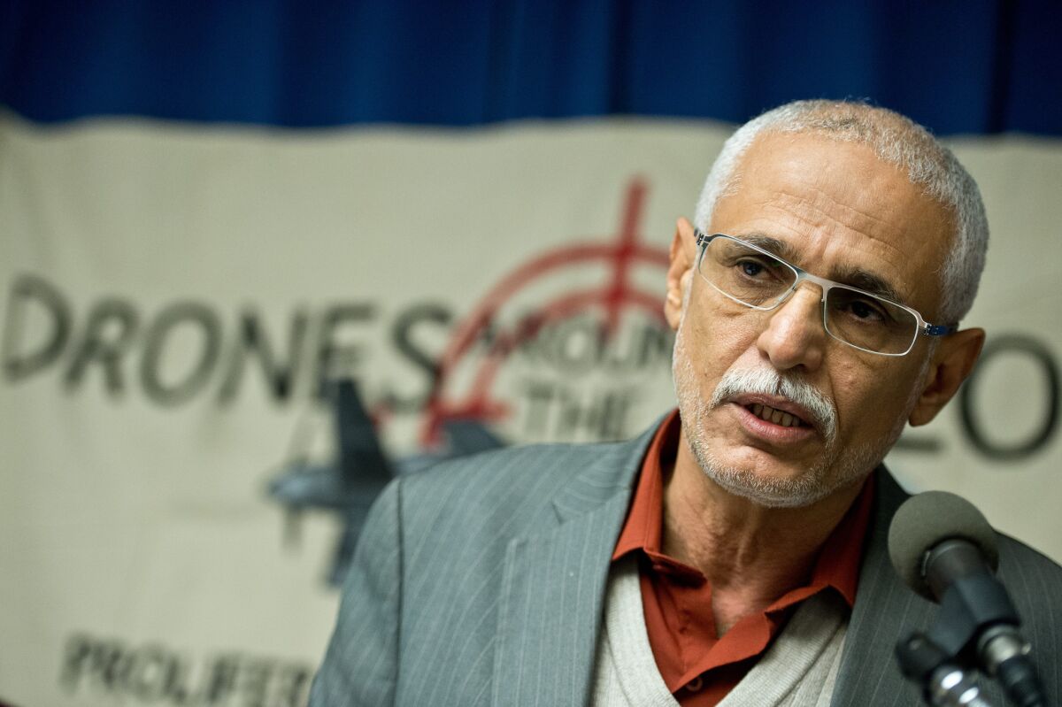 Yemeni engineer Faisal bin Ali Jaber, whose brother-in-law and nephew were killed in a 2012 drone strike, speaks at a news conference in November 2013 in Washington.