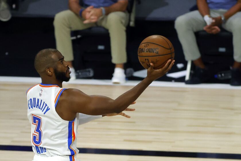 Oklahoma City Thunder's Chris Paul attempts a lay up against the Los Angeles Lakers during the first half of an NBA basketball game Wednesday, Aug. 5, 2020, in Lake Buena Vista, Fla. (Kevin C. Cox/Pool Photo via AP)