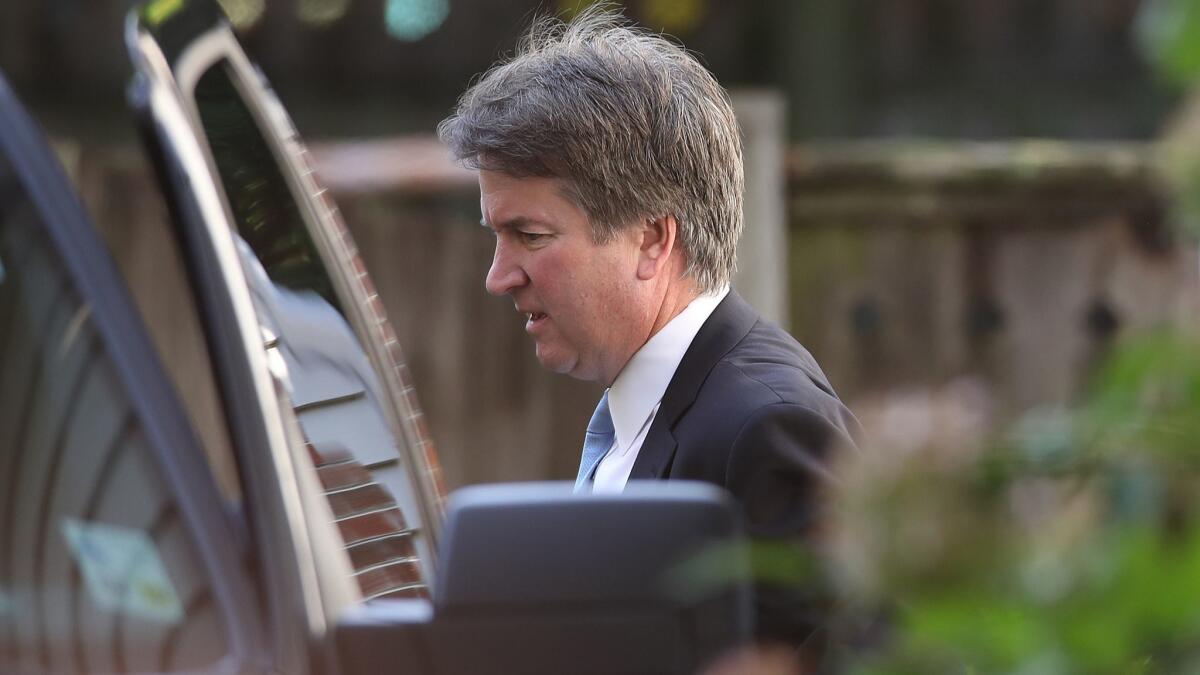 Supreme Court nominee Judge Brett Kavanaugh leaves his home in Chevy Chase, Md., on Wednesday.