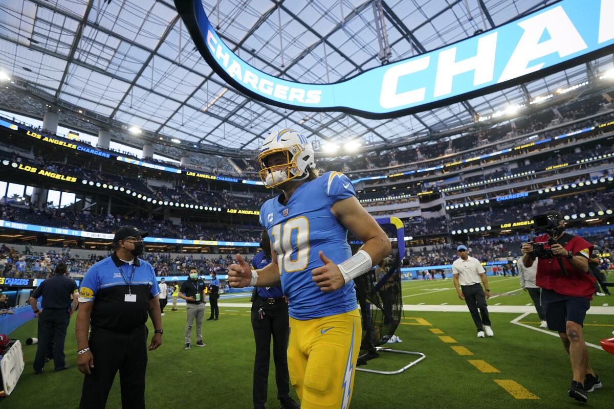 Chargers quarterback Justin Herbert leaves the field after losing to the Minnesota Vikings.
