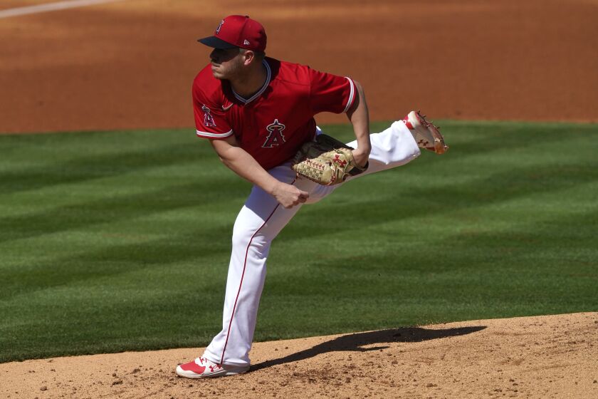 Los Angeles Angels starting pitcher Dylan Bundy throws against the Texas Rangers.