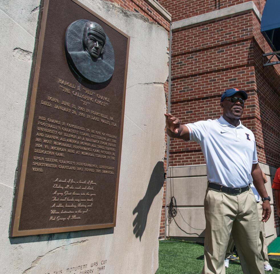 Illinois head coach Lovie Smith touches Grange Rock before entering the field for warm-ups before a game against Murray State on Sept. 3, 2016.