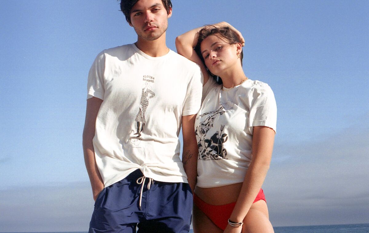 Two models wearing T-shirts
