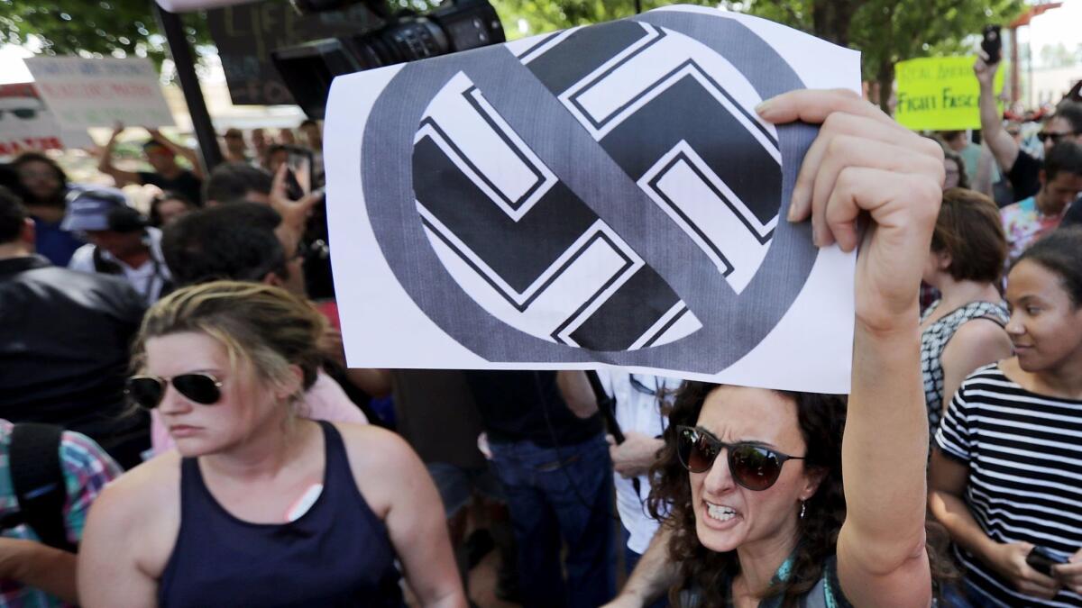 Protesters shout anti-Nazi chants in Charlottesville, Va., on Aug. 13.