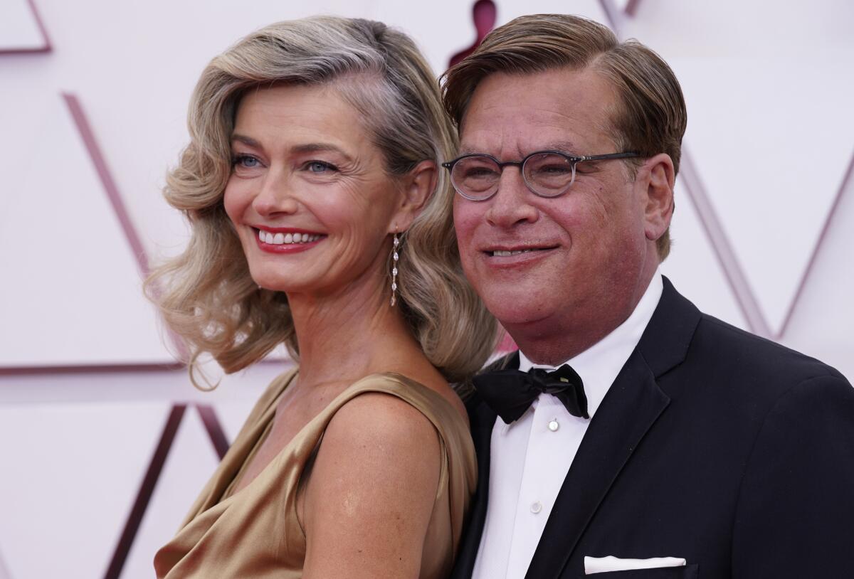 Paulina Porizkova and Aaron Sorkin arrive at the 2021 Oscars