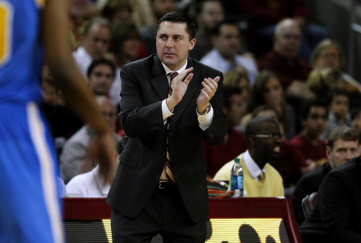 Bob Cantu, shown coaching USC in February, will be working as an assistant for another former Trojans coach, Tim Floyd, at UTEP.