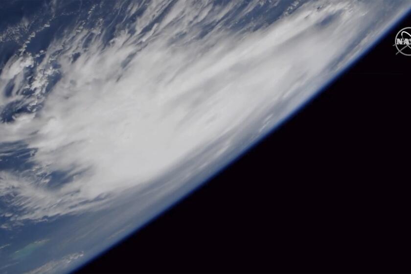 This Friday, Aug. 30, 2019 image provided by NASA shows a view of Hurricane Dorian from the International Space Station as it churned over the Atlantic Ocean. Hurricane Dorian is strengthening as it moves west toward the Bahamas and Florida. The National Hurricane Center in Miami says maximum sustained winds increased Saturday, Aug. 31 morning to 145 mph (230 kph), up from 140 mph (220 kph). (NASA via AP)