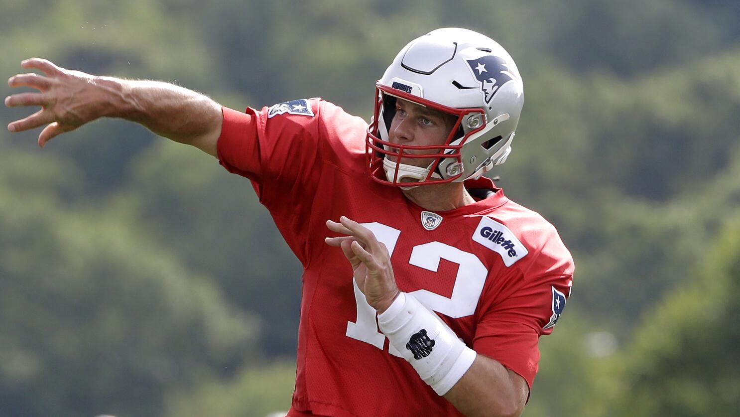 PATRIOTS STAR QUARTERBACK TOM BRADY IN THROWBACK UNIFORM 2