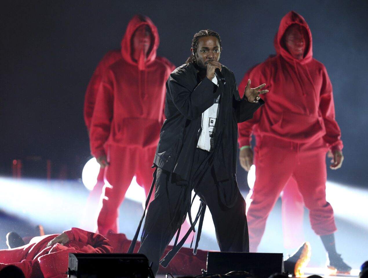 Kendrick Lamar, center, performs at the 60th Grammy Awards.