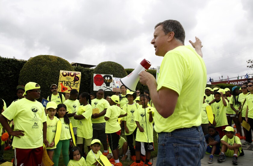 Redeemer Community Partnership president Richard Parks speaks at a protest outside of a drilling site at Jefferson Boulevard and Budlong Avenue in South Los Angeles last year.