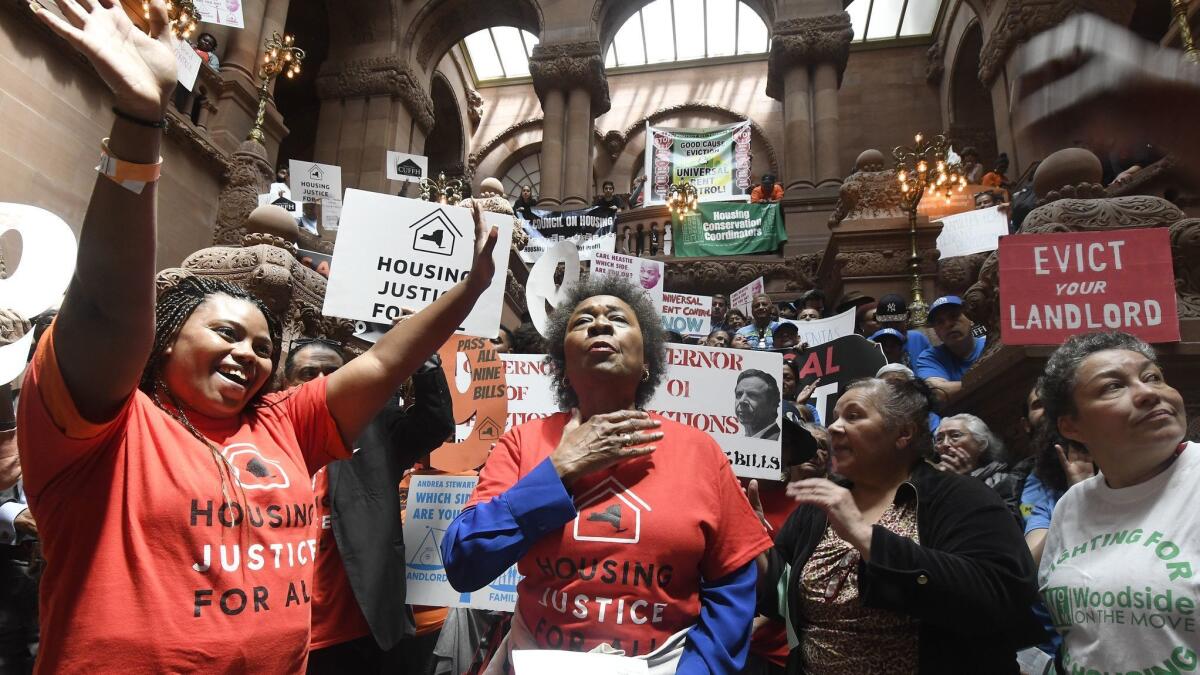 Upstate-Downstate Housing Alliance members and supporters rally June 4 for tenants' rights at the New York state Capitol in Albany.