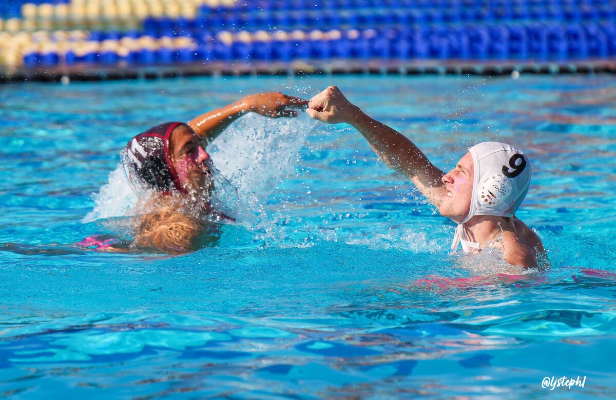Players battle it out during the "Tangle in the Tank" fundraiser.