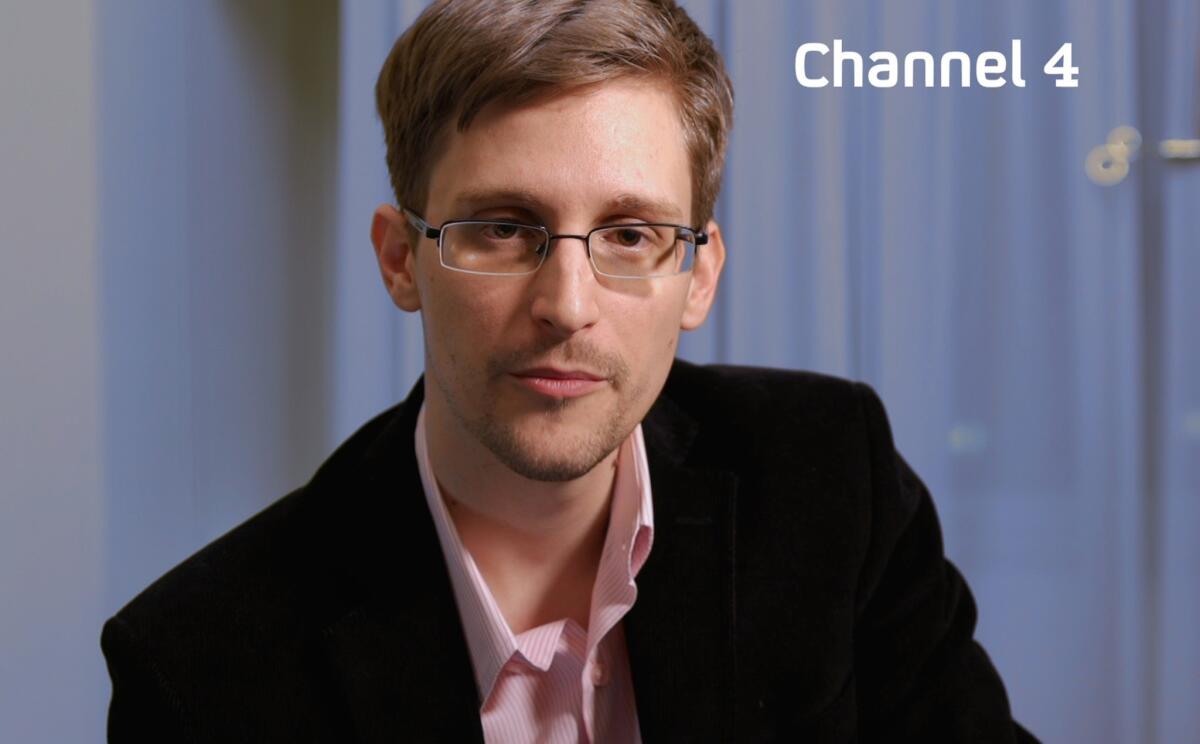 An undated handout file picture received Dec. 24 shows U.S. intelligence leaker Edward Snowden preparing to make his Christmas statement on television.