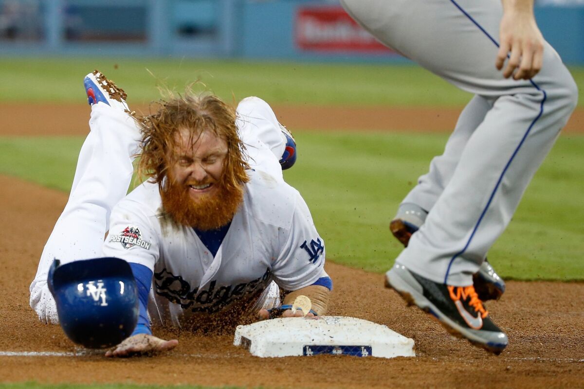 Justin Turner steals third base against the New York Mets in the third inning of game five of the National League Division Series at Dodger Stadium on Oct. 15, 2015.