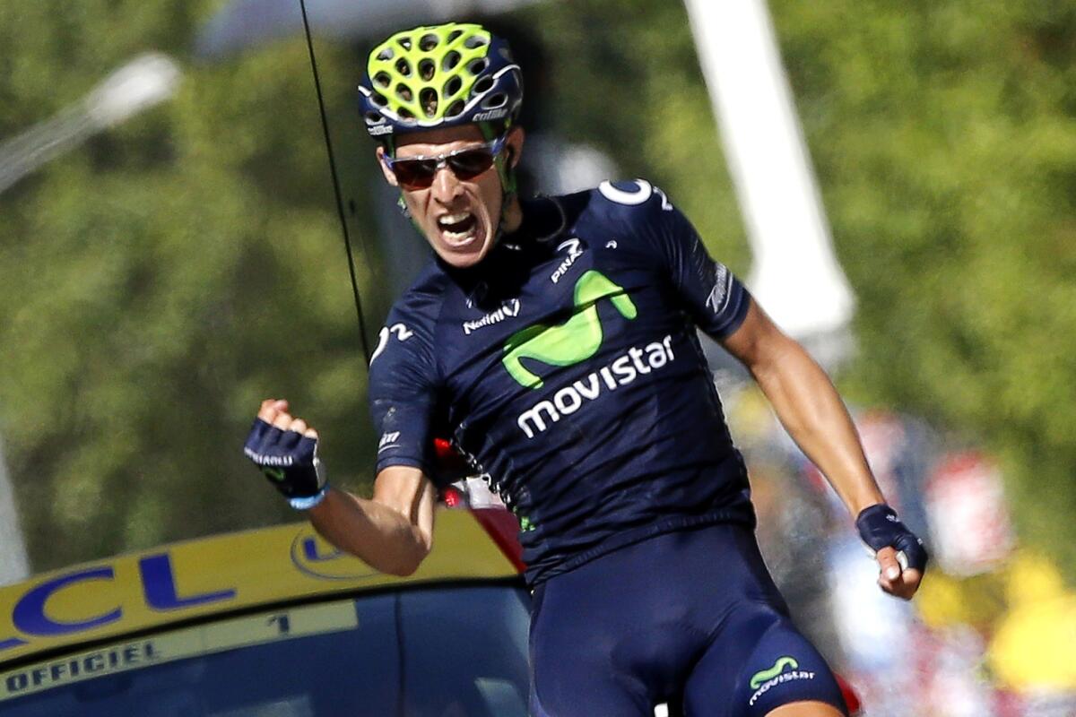 Rui Costa celebrates as he crosses the finish line to win Stage 16 of the Tour de France on Tuesday.