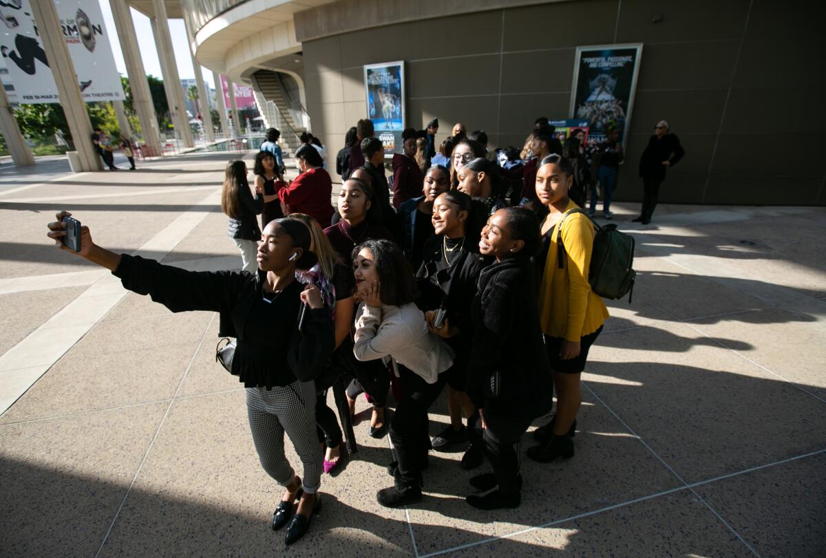 Hamilton High School students get the obligatory selfie before heading into the Ahmanson to see Matthew Bourne's "Swan Lake."