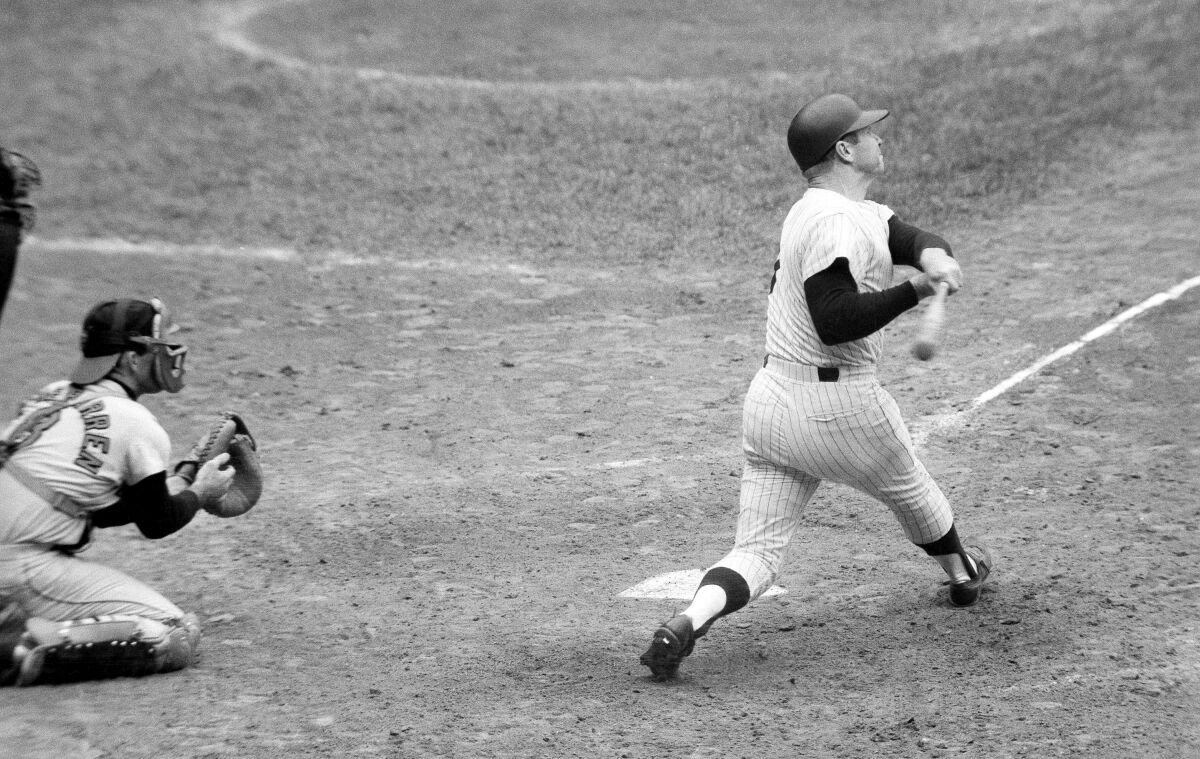 FILE - In this May 14, 1967, file photo, Mickey Mantle follows through on the 500th home run of his career, against the Baltimore Orioles in New York. Former Yankees star Joe Pepitone has filed a lawsuit against the National Baseball Hall of Fame and Museum seeking the return of the Louisville Slugger bat that Mantle used to hit the home run. (AP Photo, File)