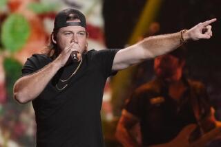 FILE - Morgan Wallen performs on the first night of the 2022 iHeartRadio Music Festival, on Sept. 23, 2022, in Las Vegas. Thousands of country music fans were awaiting the singer when he suddenly canceled his performance Sunday night, April 23, 2023, at Vaught Hemingway Stadium. WTVA-TV reported that video boards inside the Ole Miss football stadium showed a message that said the singer had lost his voice and was unable to perform, adding that people would be refunded their money where they bought their tickets. (AP Photo/John Locher, File)