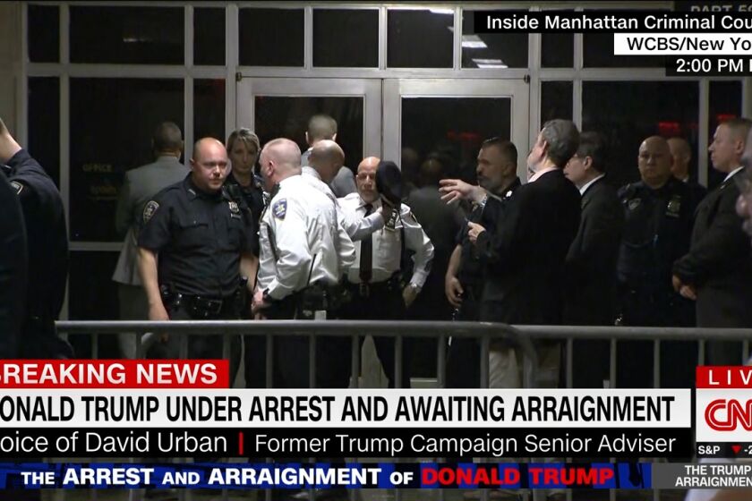 CNN coverage of the arraignment of Donald Trump on April 4, 2023.